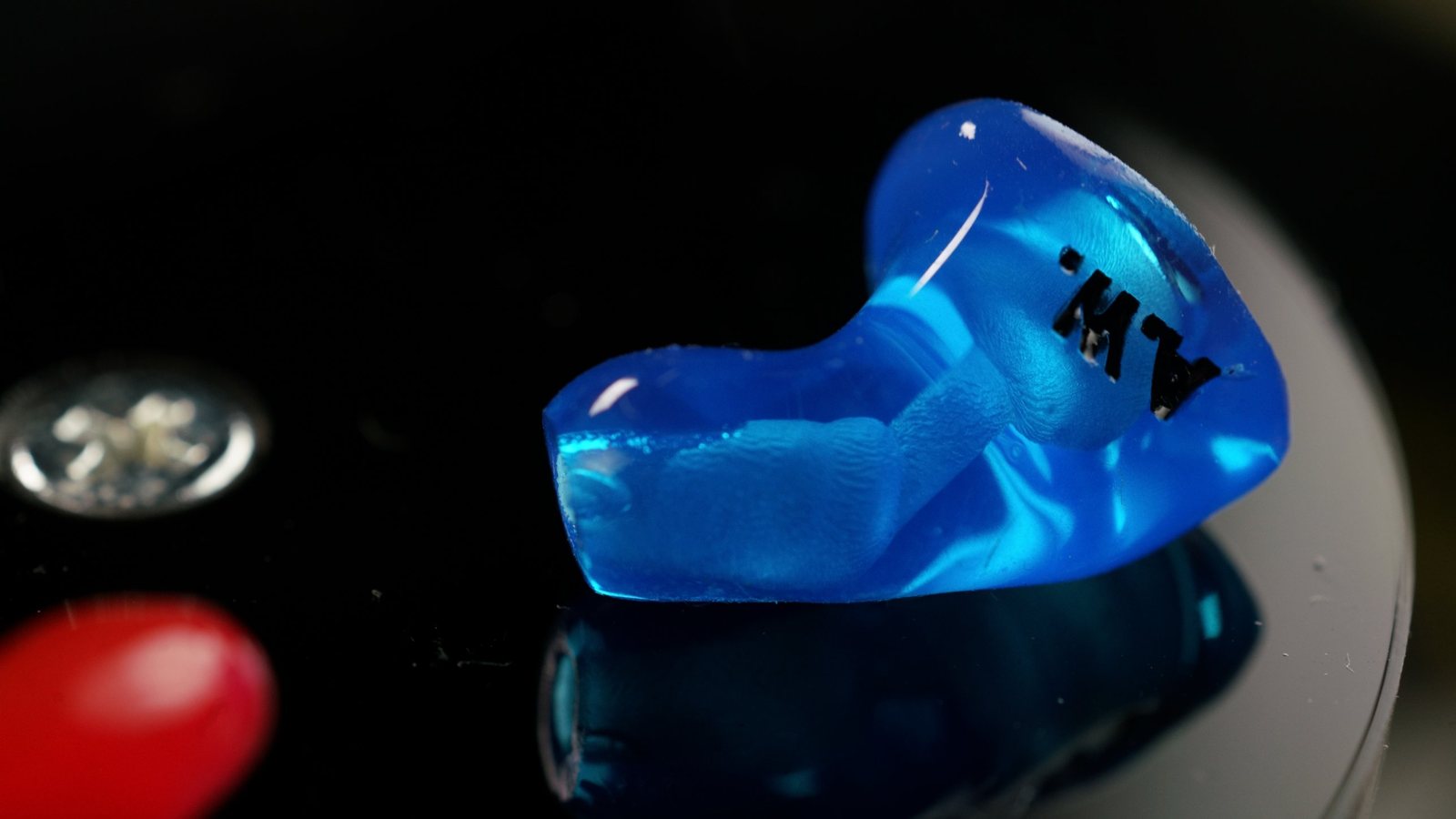 Close-up of a blue custom CEP aviation adapter