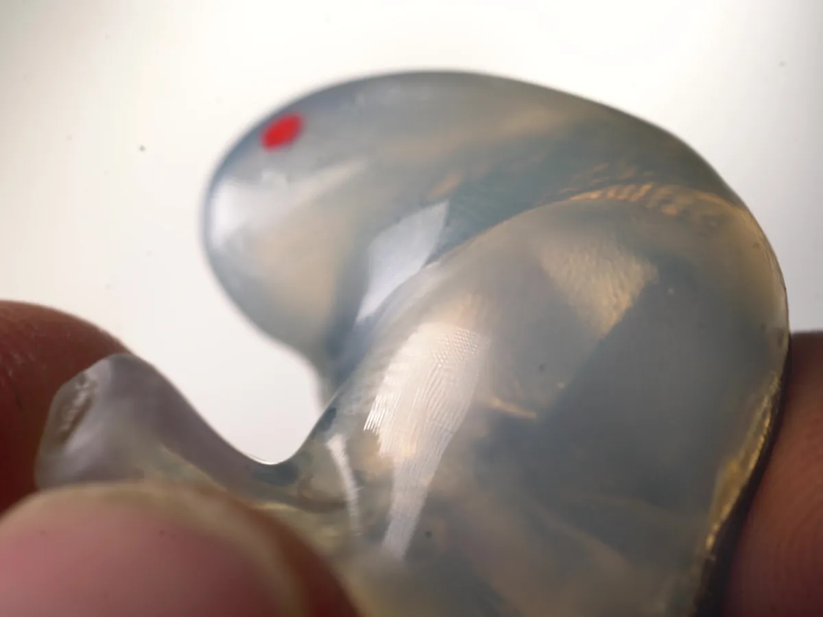 Close-up of the soft silicone body and canal tip of a Big Ear custom headphone