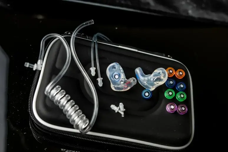 The One Premium &mdash; custom filtered earplug with the full interchangeable filter kit